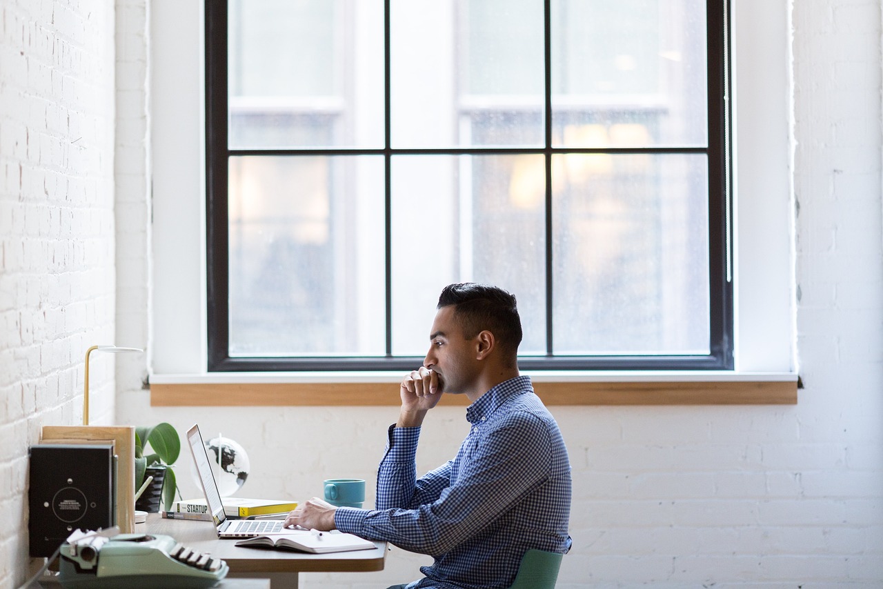 person looking at computer